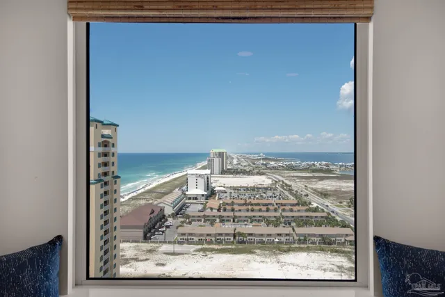 a view of a living room with a wooden floor