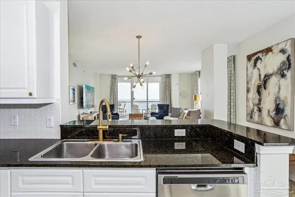 a bedroom with bed and a couch