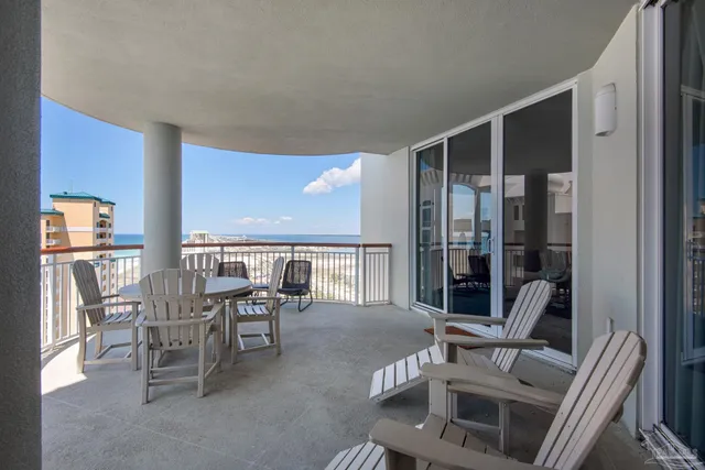 a view of a chairs and table in the terrace