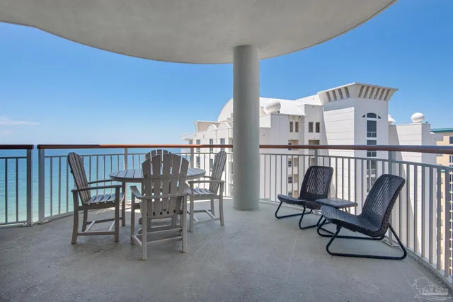 a bedroom with a bed and flat screen tv