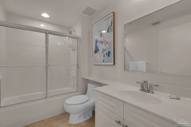 a dining room with furniture and a table