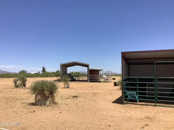 a view of a house with a snow in the yard