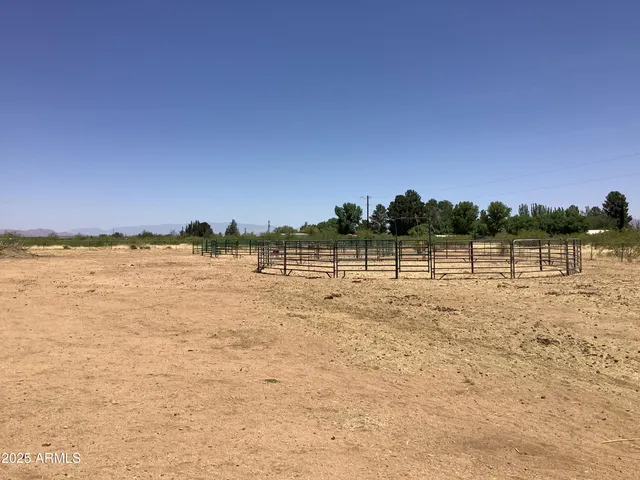 a view of a lake with houses in background