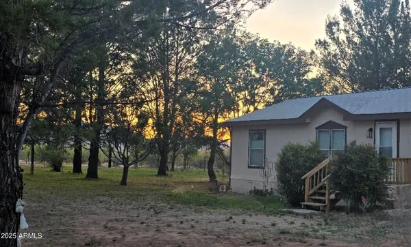 a view of outdoor space and yard