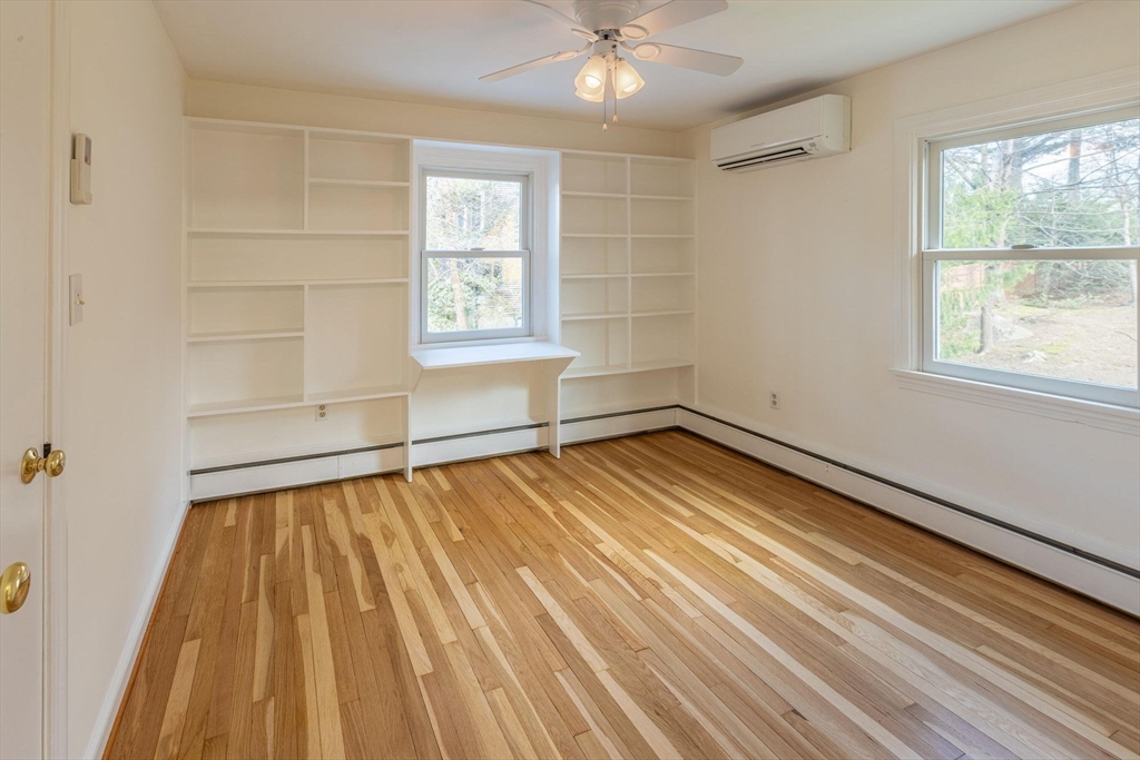 41 Labor In Vain Road Ipswich, MA 01938 - Photo 27 of 33 a view of an empty room with wooden floor and a window