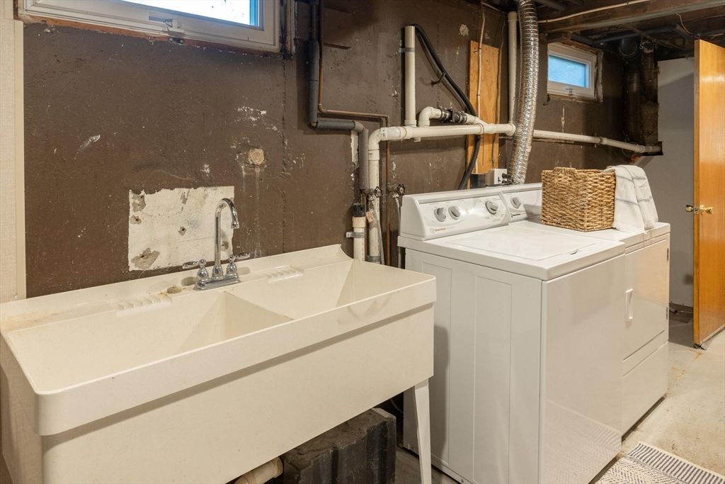 41 Labor In Vain Road Ipswich, MA 01938 - Photo 31 of 33 a utility room with dryer and washer