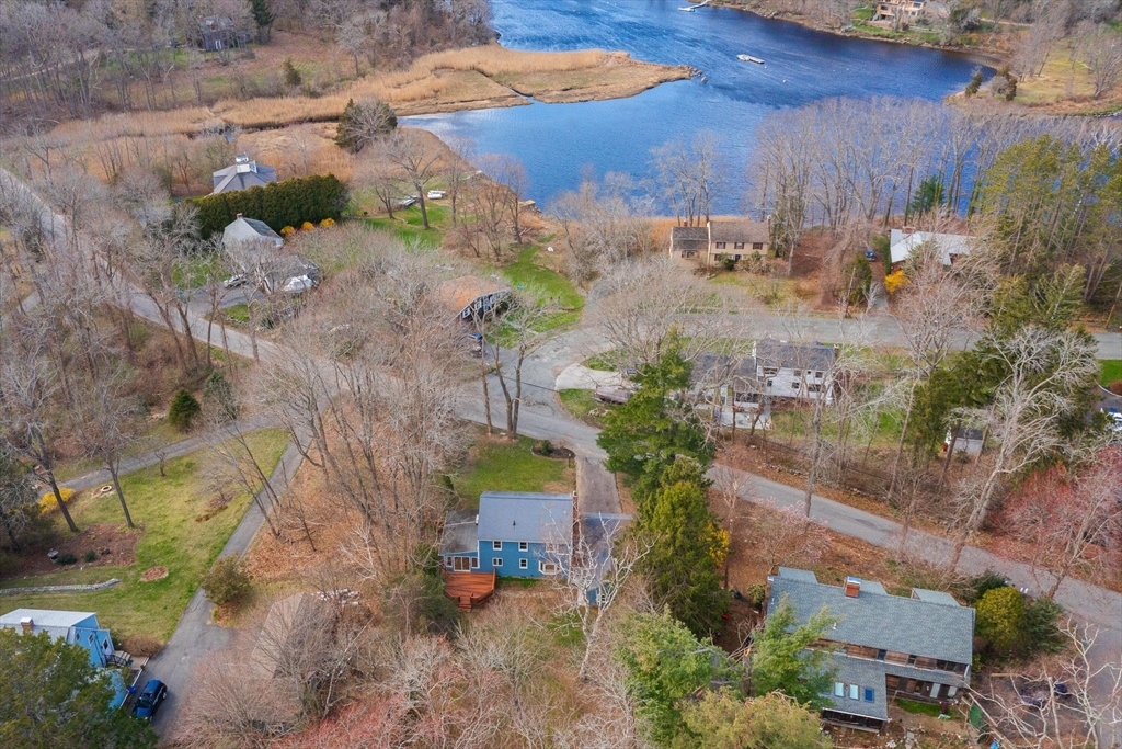 41 Labor In Vain Road Ipswich, MA 01938 - Photo 8 of 33 an aerial view of a house with a yard