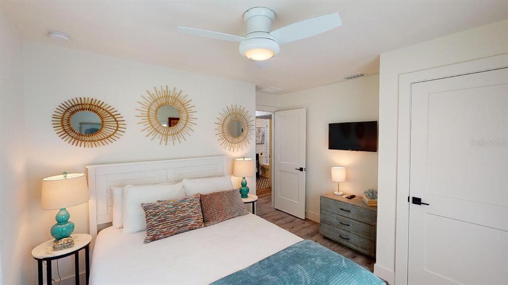 1920 Morrill Street, Unit PINEAPPLE Sarasota, FL 34236 - Photo 22 of 37 a living room with furniture and a flat screen tv