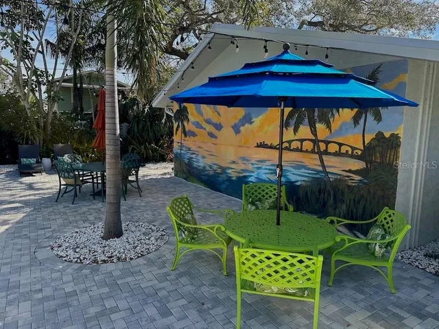 a view of a table and chairs in patio