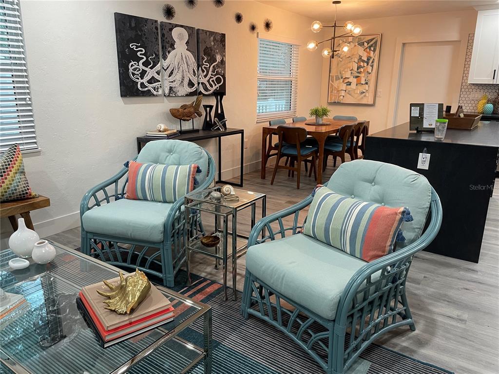 1920 Morrill Street, Unit PINEAPPLE Sarasota, FL 34236 - Photo 5 of 37 a living room with furniture and wooden floor