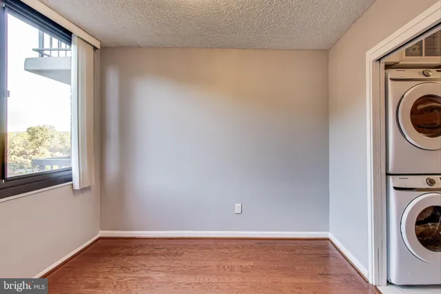 a view of a storage & utility room with washer and dryer
