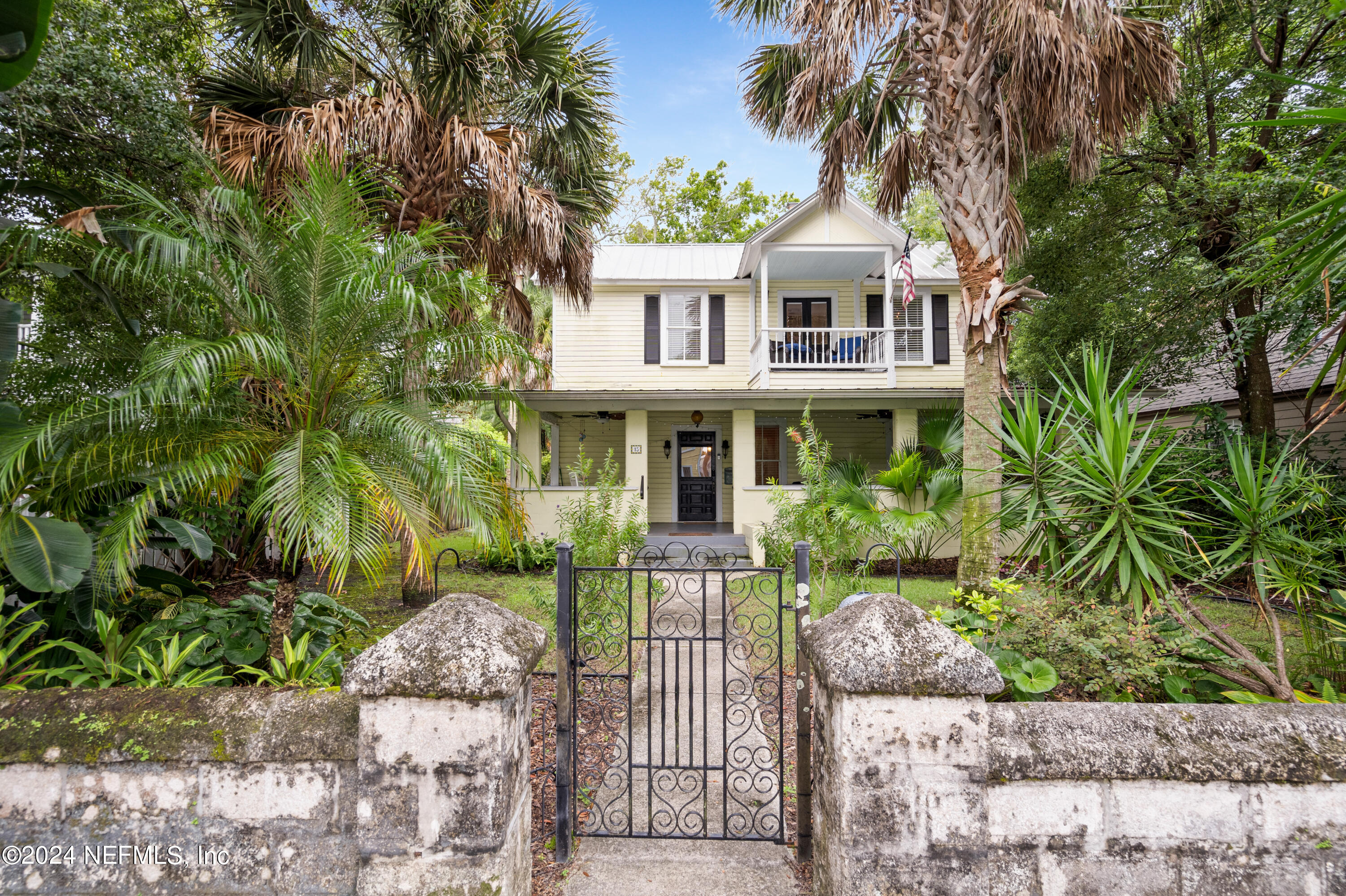 15 Rohde Avenue St. Augustine, FL 32084 - Photo 12 of 36 a front view of a house with a garden