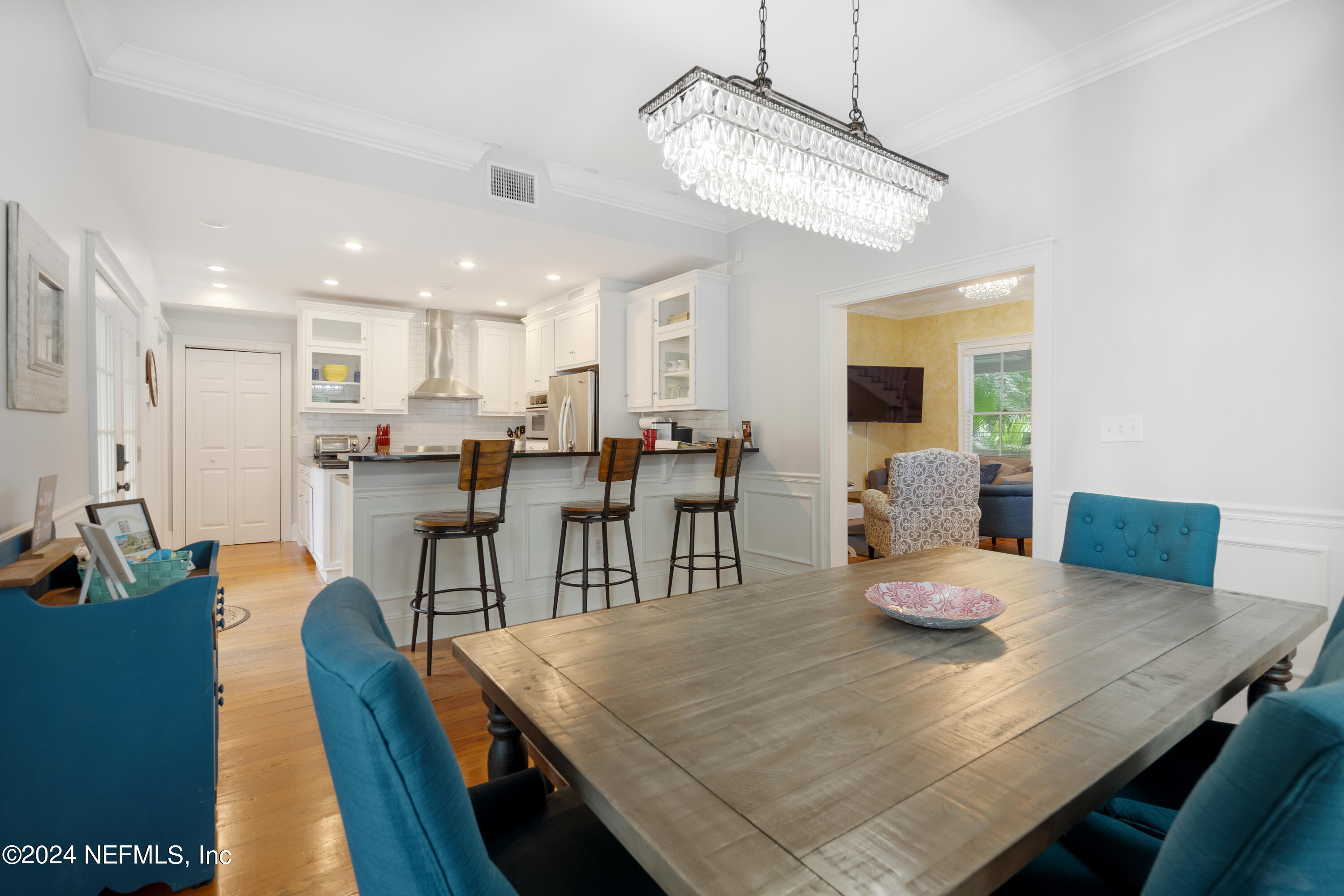 15 Rohde Avenue St. Augustine, FL 32084 - Photo 20 of 36 a view of a dining room with furniture and wooden floor