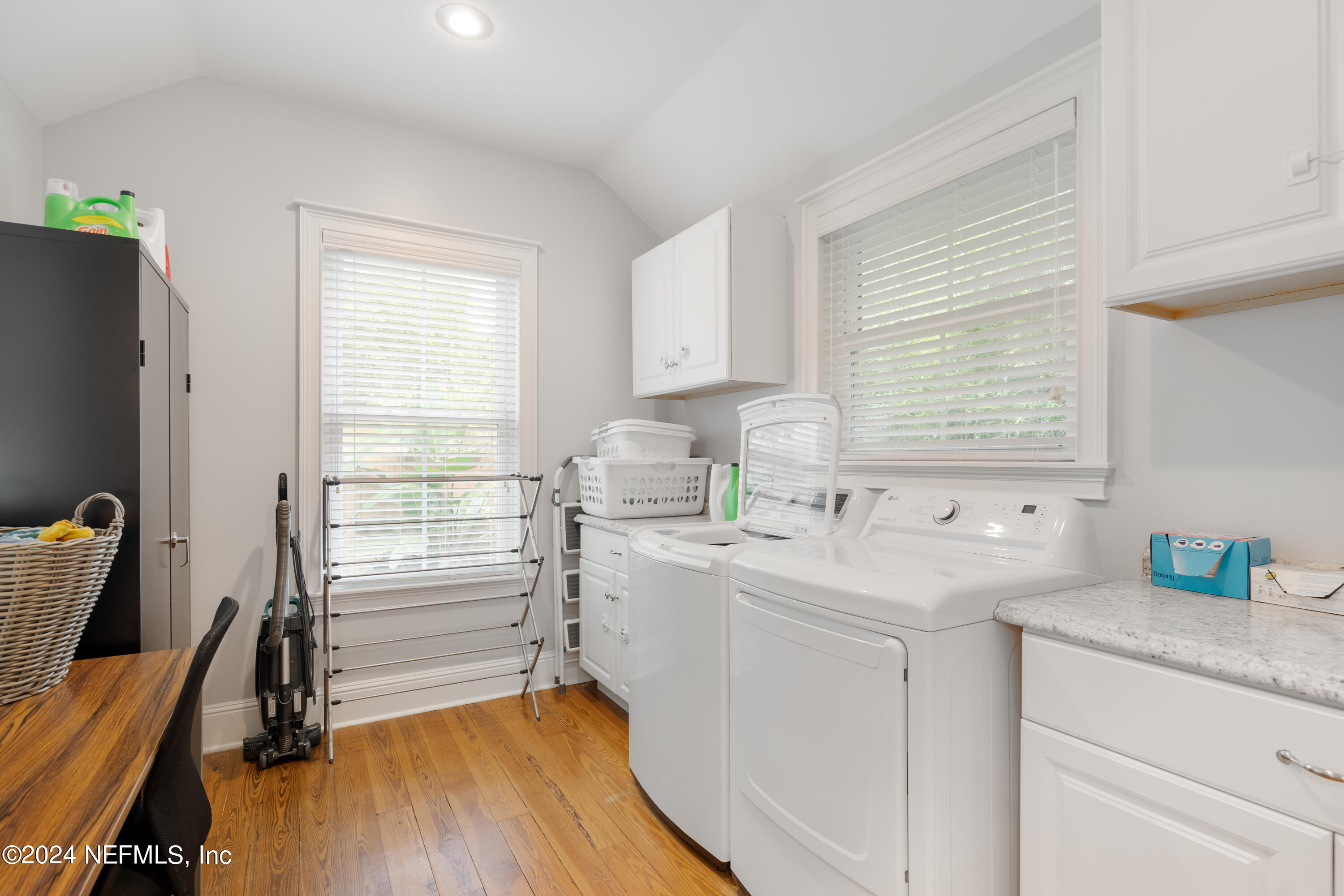 15 Rohde Avenue St. Augustine, FL 32084 - Photo 25 of 36 a kitchen with a sink window and cabinets