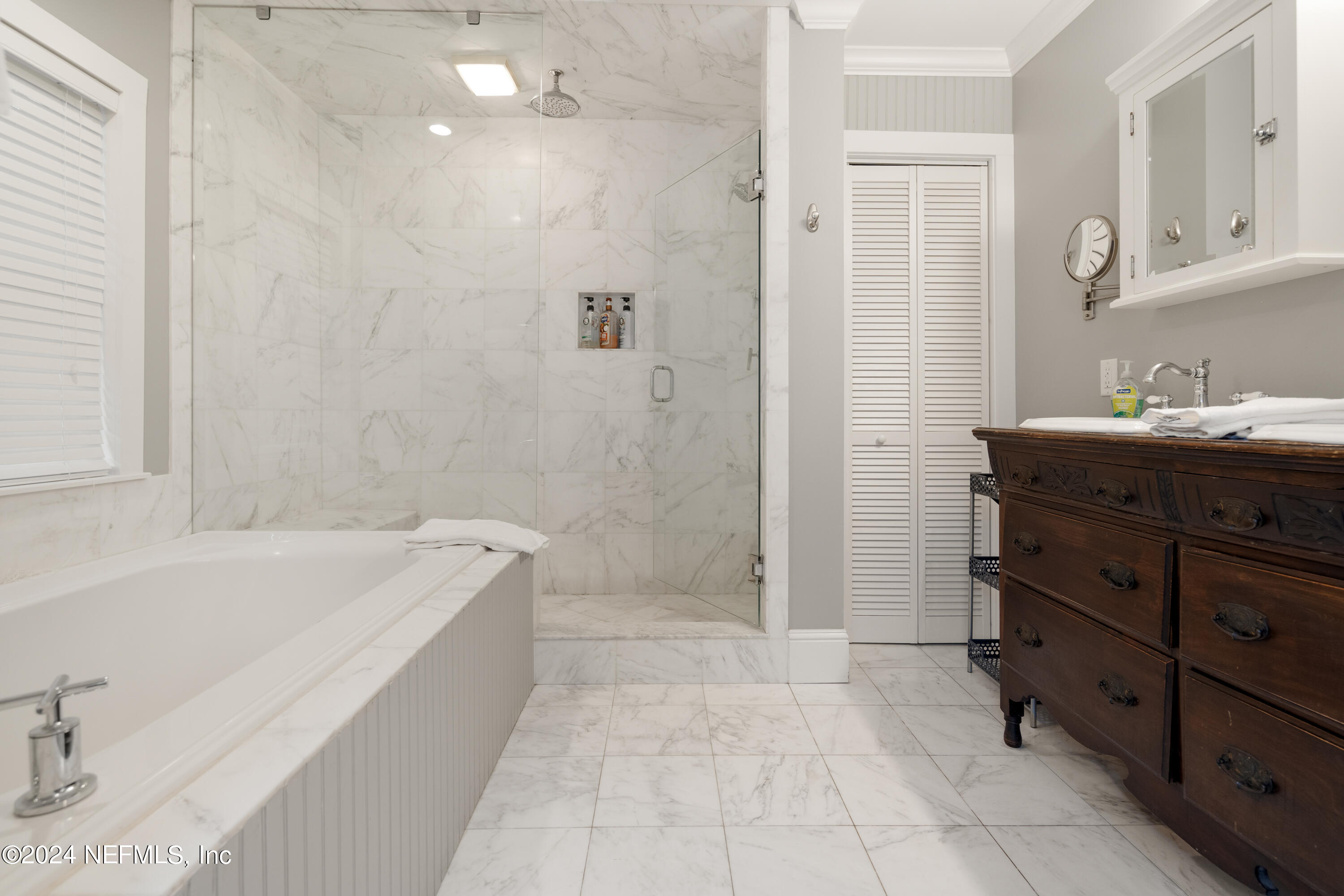 15 Rohde Avenue St. Augustine, FL 32084 - Photo 33 of 36 a bathroom with a granite countertop sink a toilet and shower