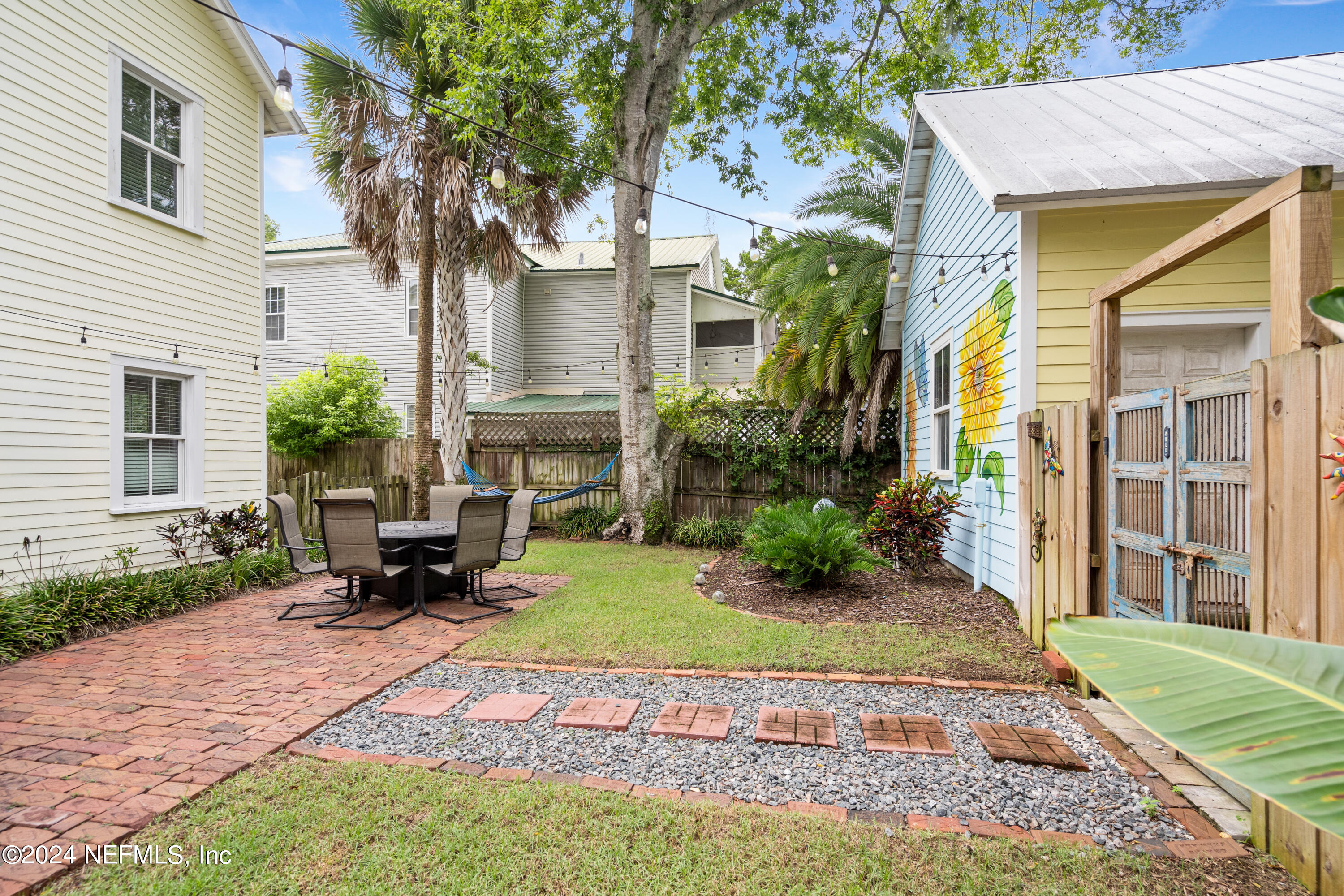 15 Rohde Avenue St. Augustine, FL 32084 - Photo 5 of 36 a view of a house with backyard and sitting area