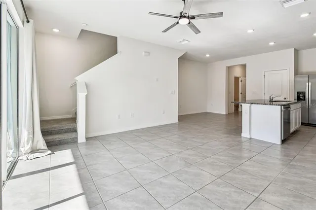 a view of a kitchen with a sink