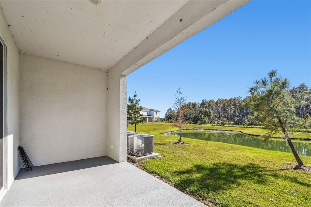 32173 Turtle Grace Loop Wesley Chapel, FL 33545 - Photo 35 of 41 a view of an outdoor space and swimming pool