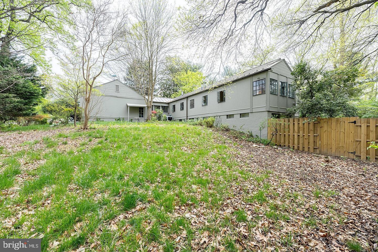 9120 Levelle Drive Chevy Chase, MD 20815 - Photo 17 of 17 a white house that has tree in front of it