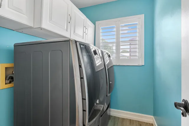 a view of a refrigerator and window