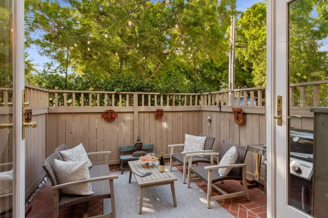 a bedroom with a bed and a fireplace
