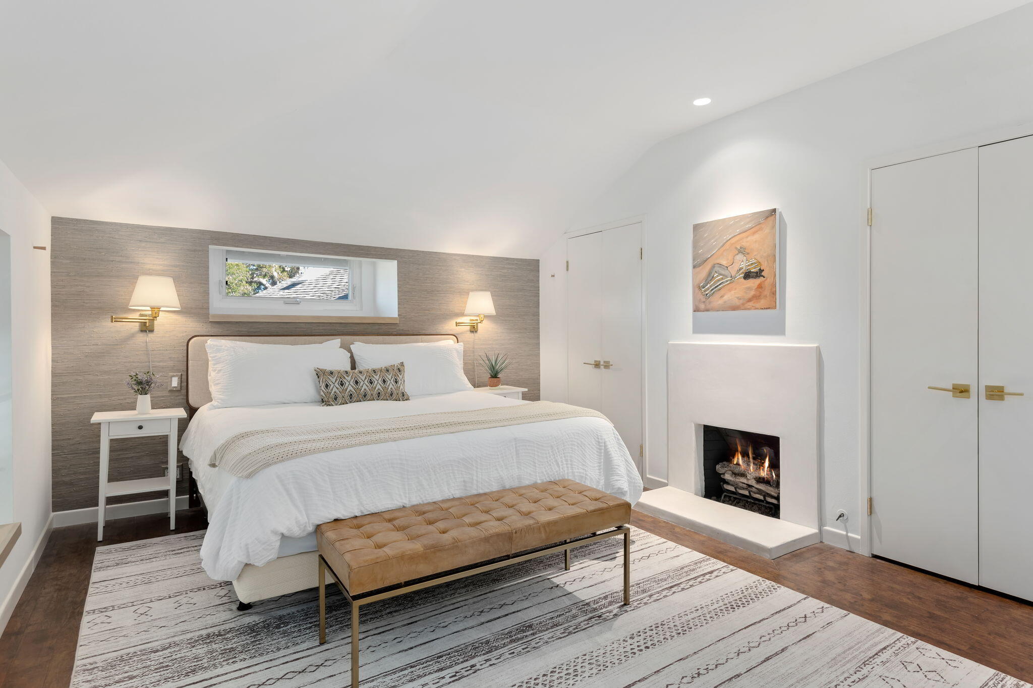 Undisclosed Address Santa Barbara, CA 93101 - Photo 12 of 20 a bedroom with a bed and a fireplace