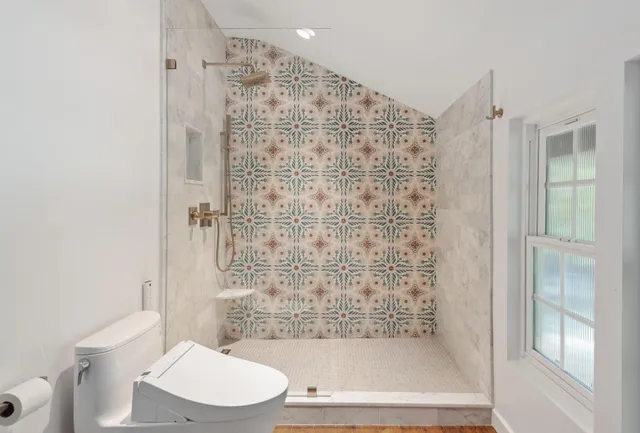 a bathroom with a double vanity sink and mirror