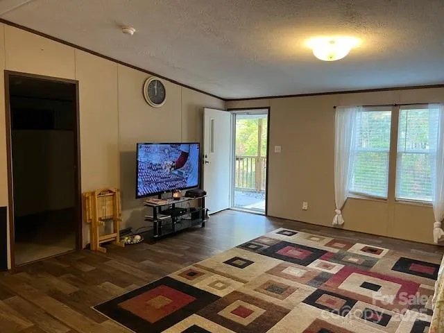 a living room with couch and a window
