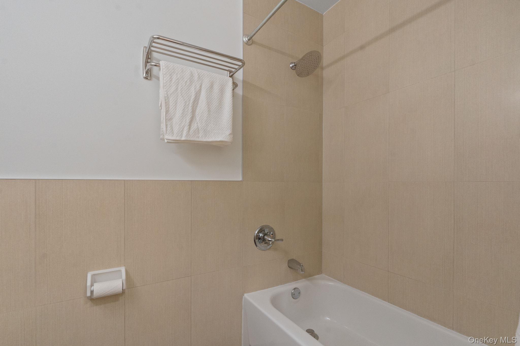2360 Amsterdam Avenue, Unit 2C Manhattan, NY 10033 - Photo 11 of 29 Bathroom featuring washtub / shower combination