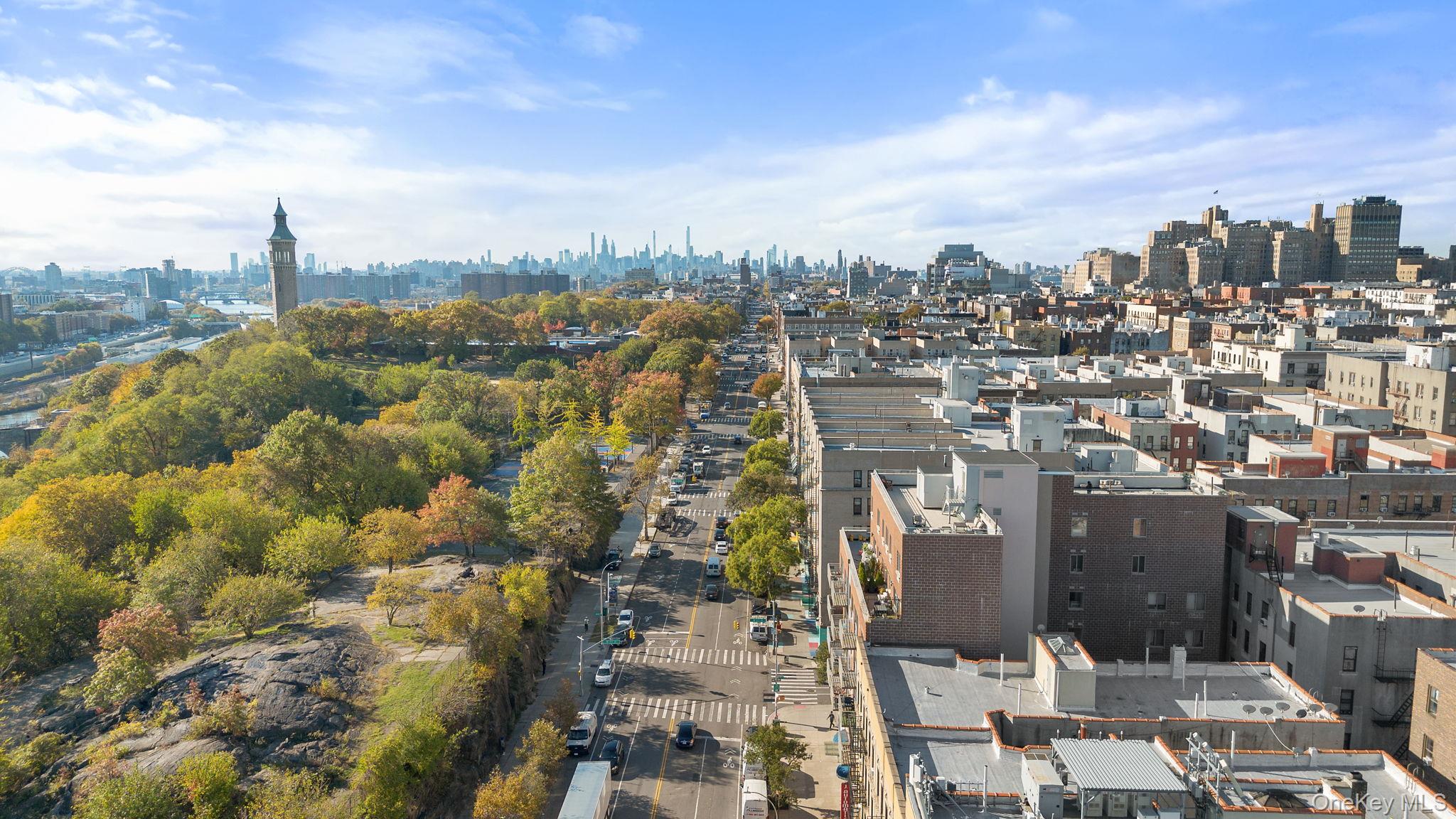 2360 Amsterdam Avenue, Unit 2C Manhattan, NY 10033 - Photo 27 of 29 Aerial view of property and surrounding area with skyline