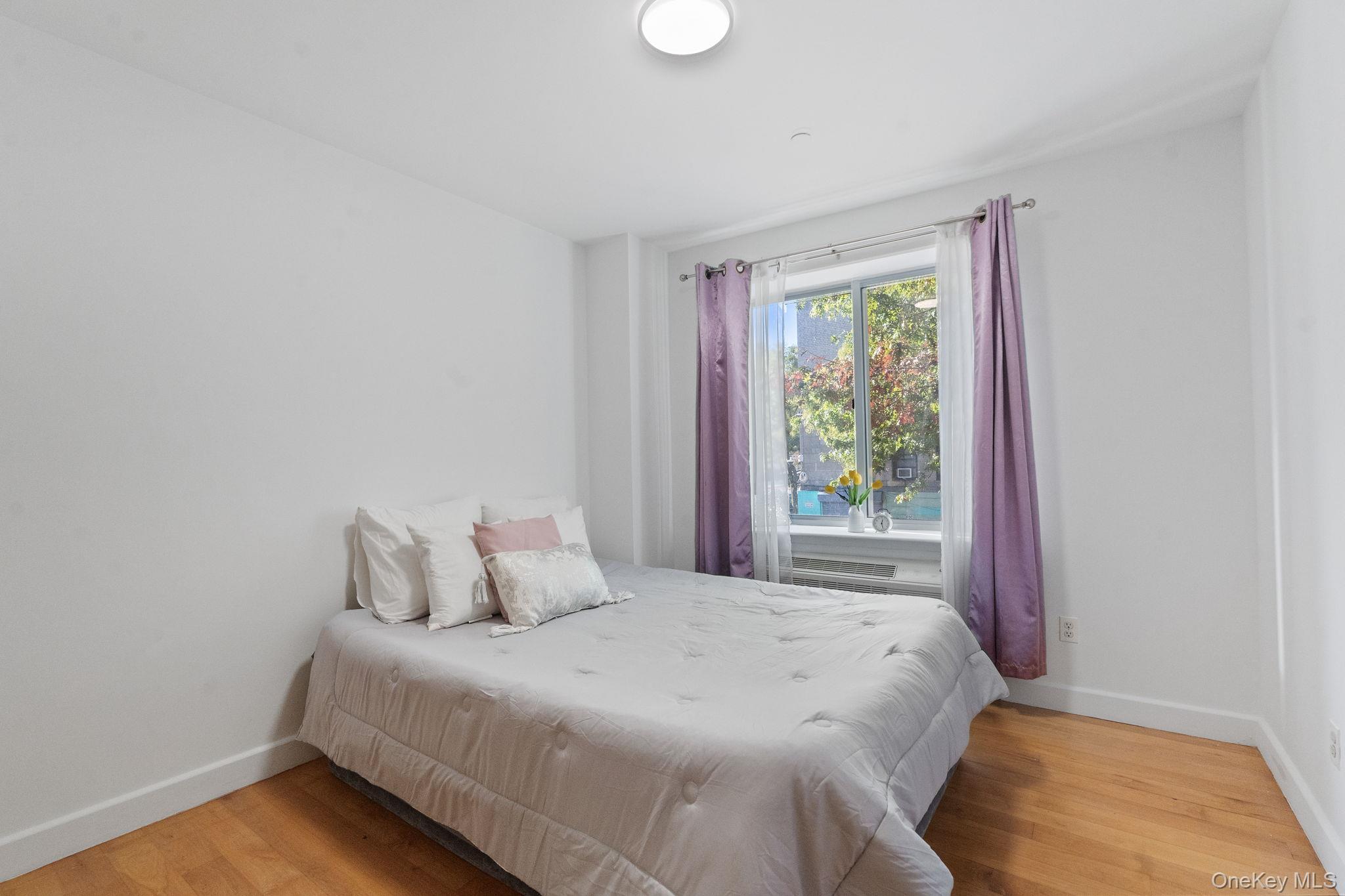 2360 Amsterdam Avenue, Unit 2C Manhattan, NY 10033 - Photo 7 of 29 Bedroom with light wood finished floors