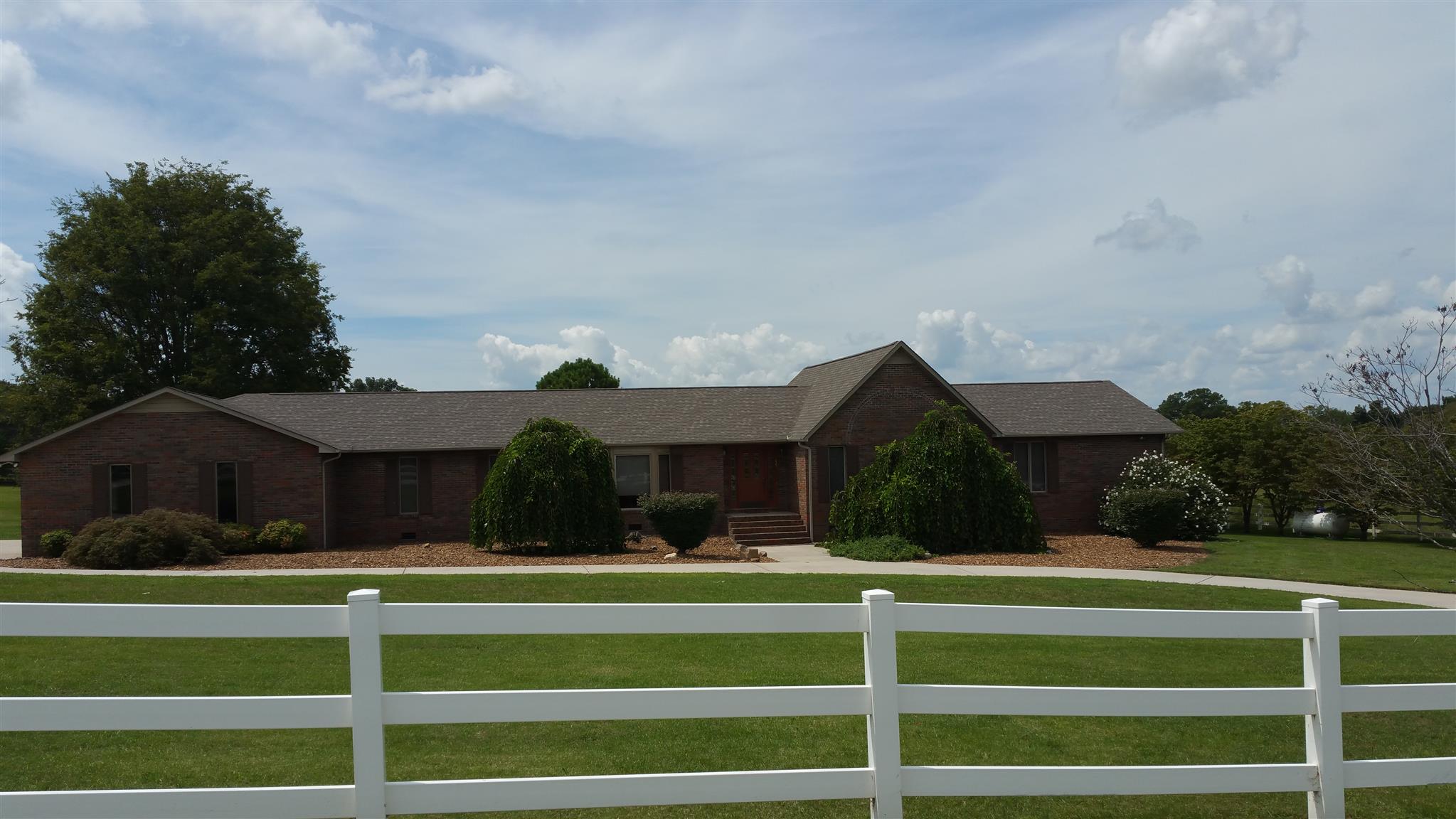 155 Knights Church Road Decherd, TN 37324 - Photo 1 of 29 a view of house with a big yard plants and large trees