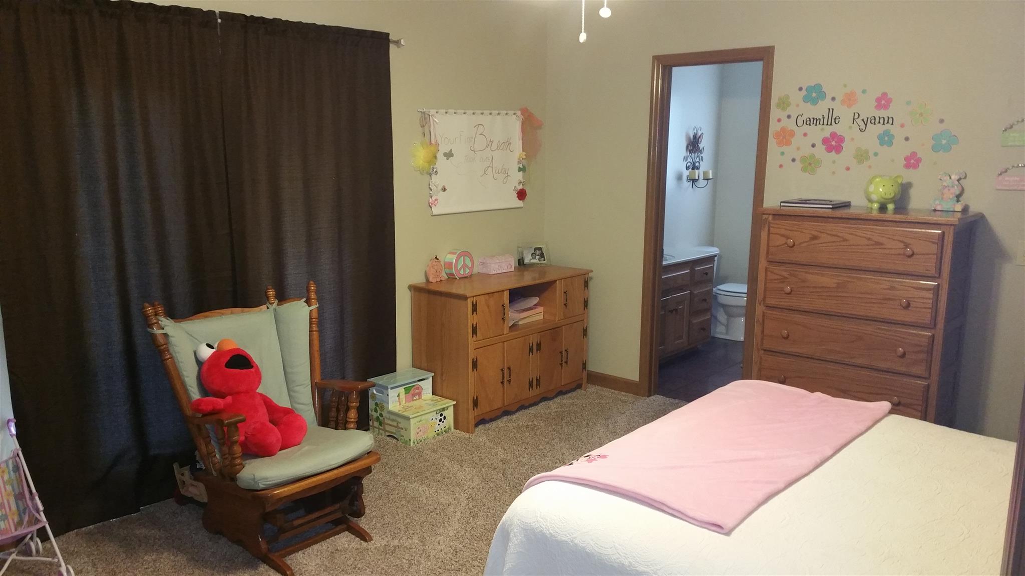 155 Knights Church Road Decherd, TN 37324 - Photo 15 of 29 a bedroom with a bed and furniture