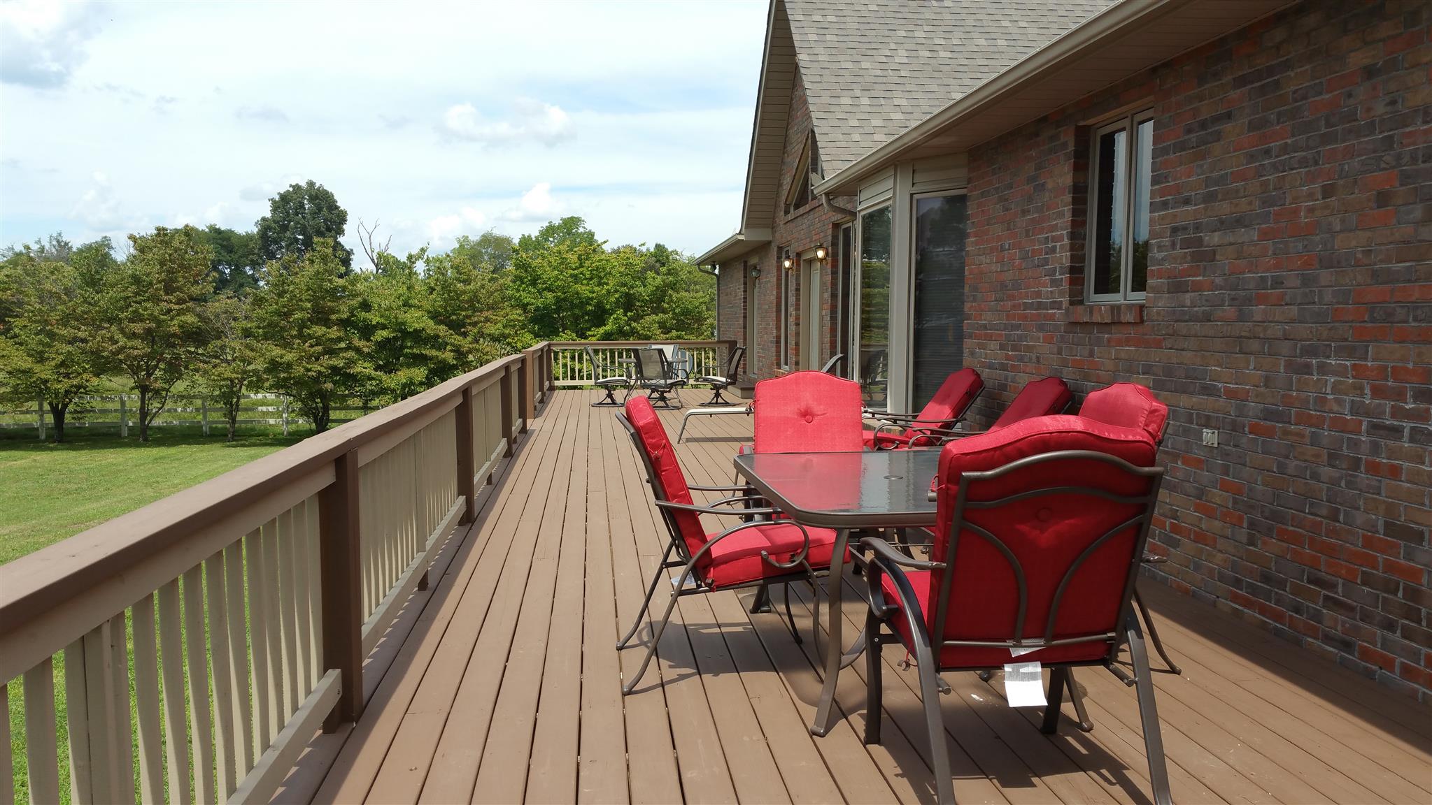 155 Knights Church Road Decherd, TN 37324 - Photo 18 of 29 a patio with wooden floor and outdoor seating