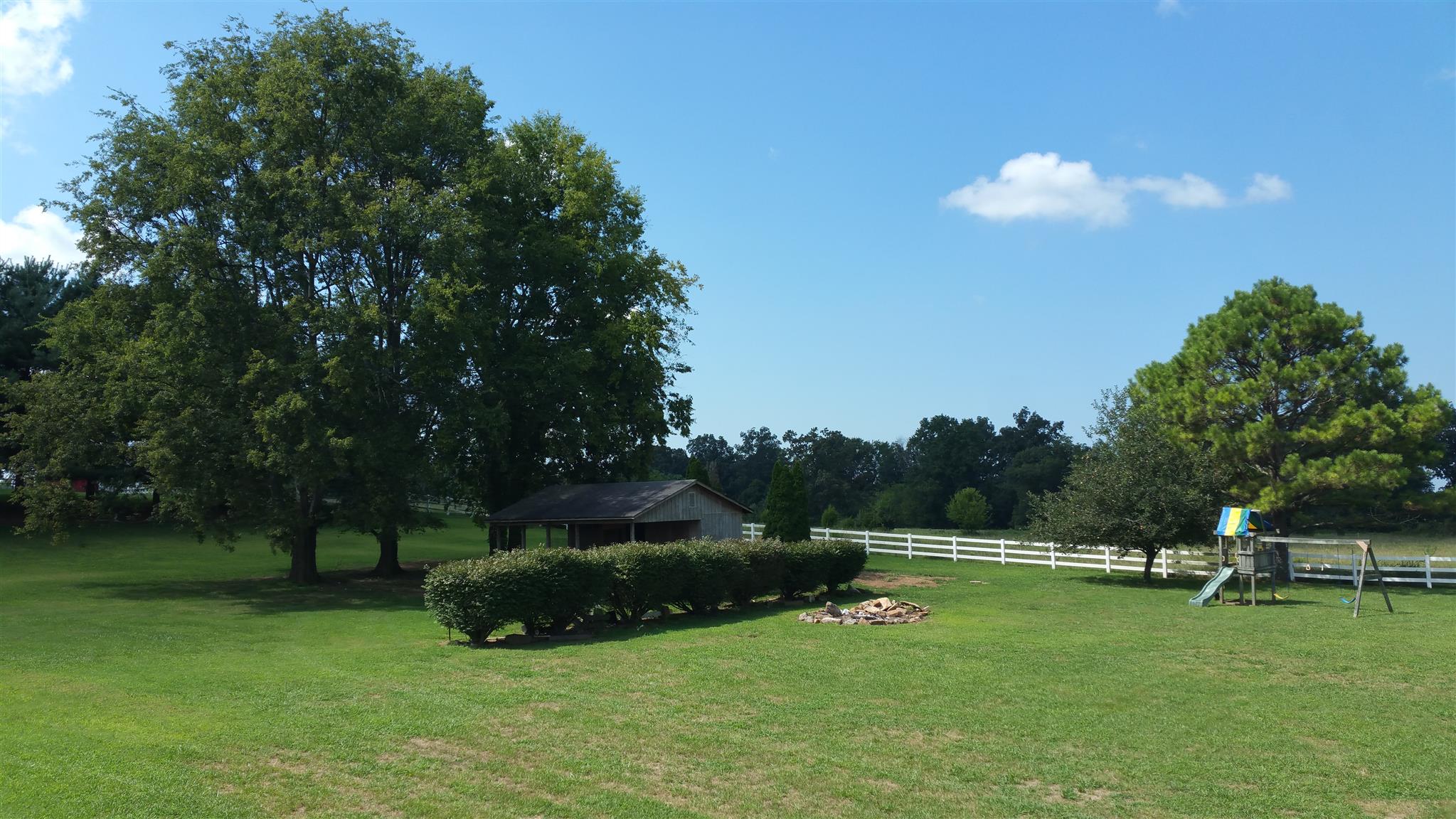 155 Knights Church Road Decherd, TN 37324 - Photo 23 of 29 a view of a golf course with a lake