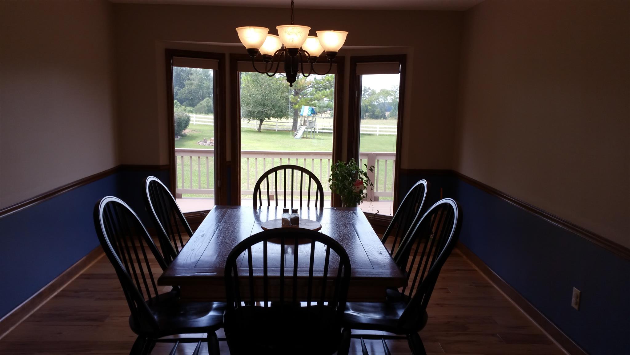 155 Knights Church Road Decherd, TN 37324 - Photo 6 of 29 a view of a dining room with furniture window and outside view