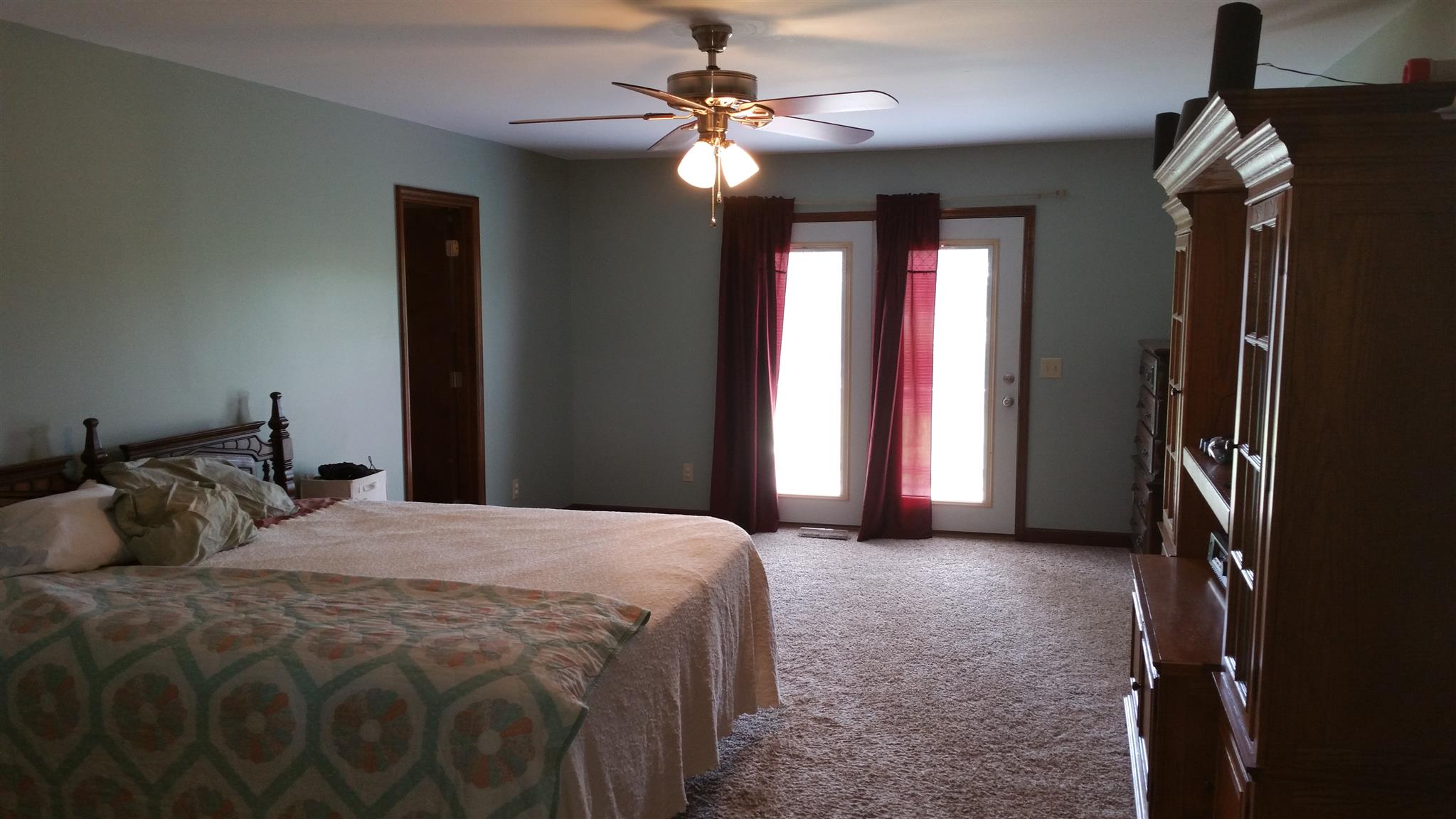 155 Knights Church Road Decherd, TN 37324 - Photo 9 of 29 a bedroom with a bed and a chandelier