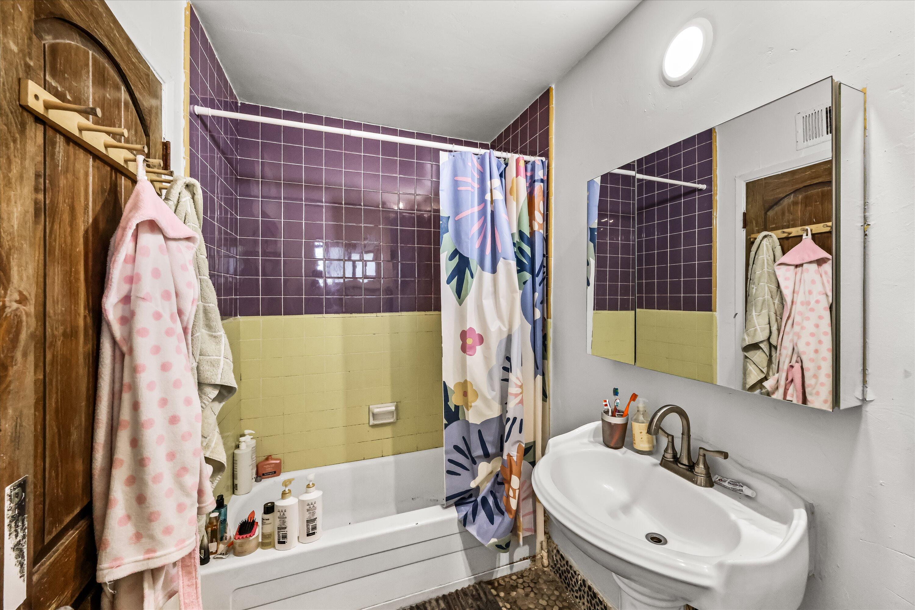 6880 Pasado Road Goleta, CA 93117 - Photo 11 of 15 a bathroom with a sink and a mirror