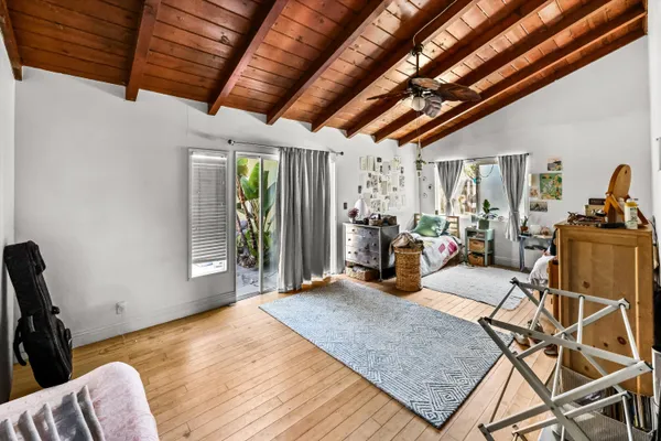 a bed room with furniture and a window