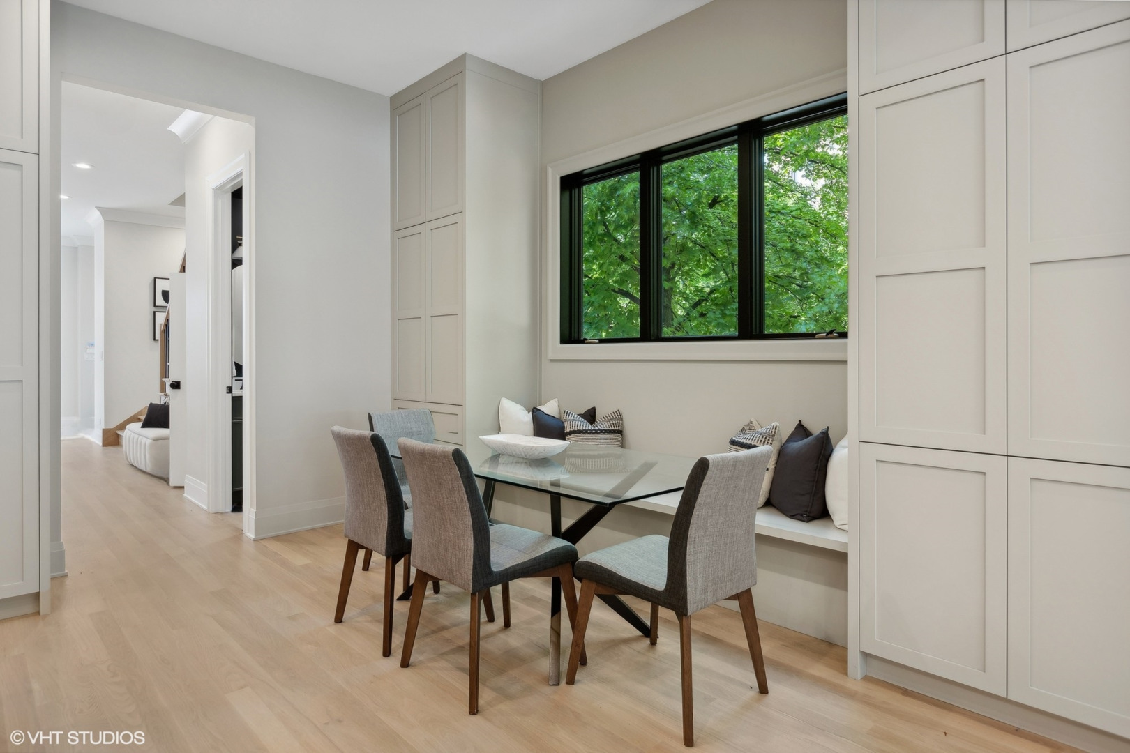 1850 West Cuyler Avenue Chicago, IL 60613 - Photo 11 of 58 a view of a dining room with furniture window and outside view