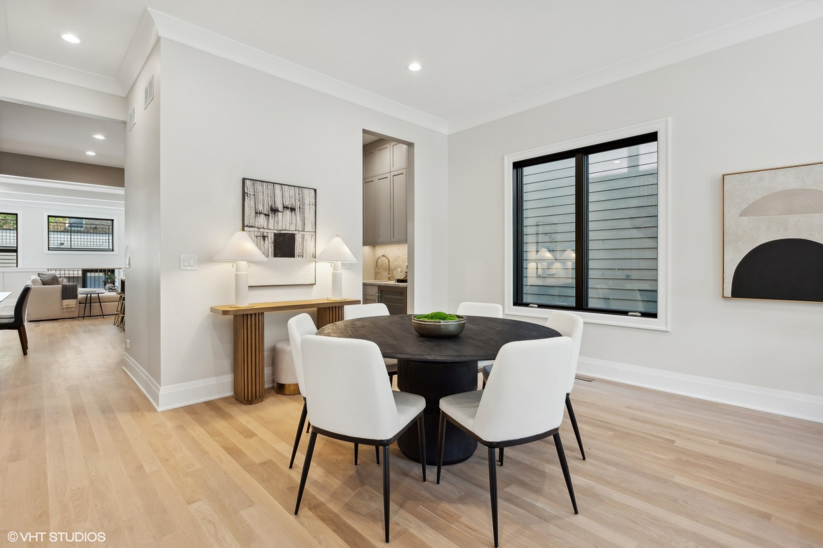 1850 West Cuyler Avenue Chicago, IL 60613 - Photo 4 of 58 a view of a dining room with furniture and wooden floor