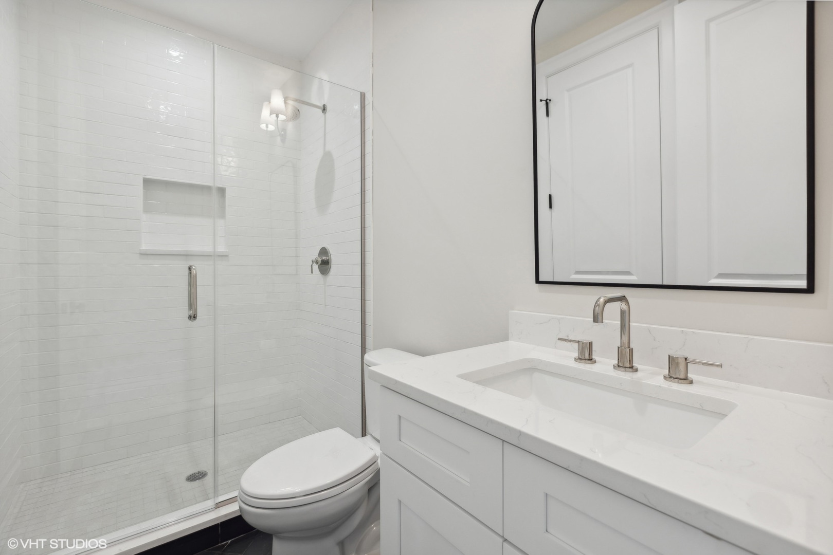 1850 West Cuyler Avenue Chicago, IL 60613 - Photo 51 of 58 a bathroom with a sink toilet and shower