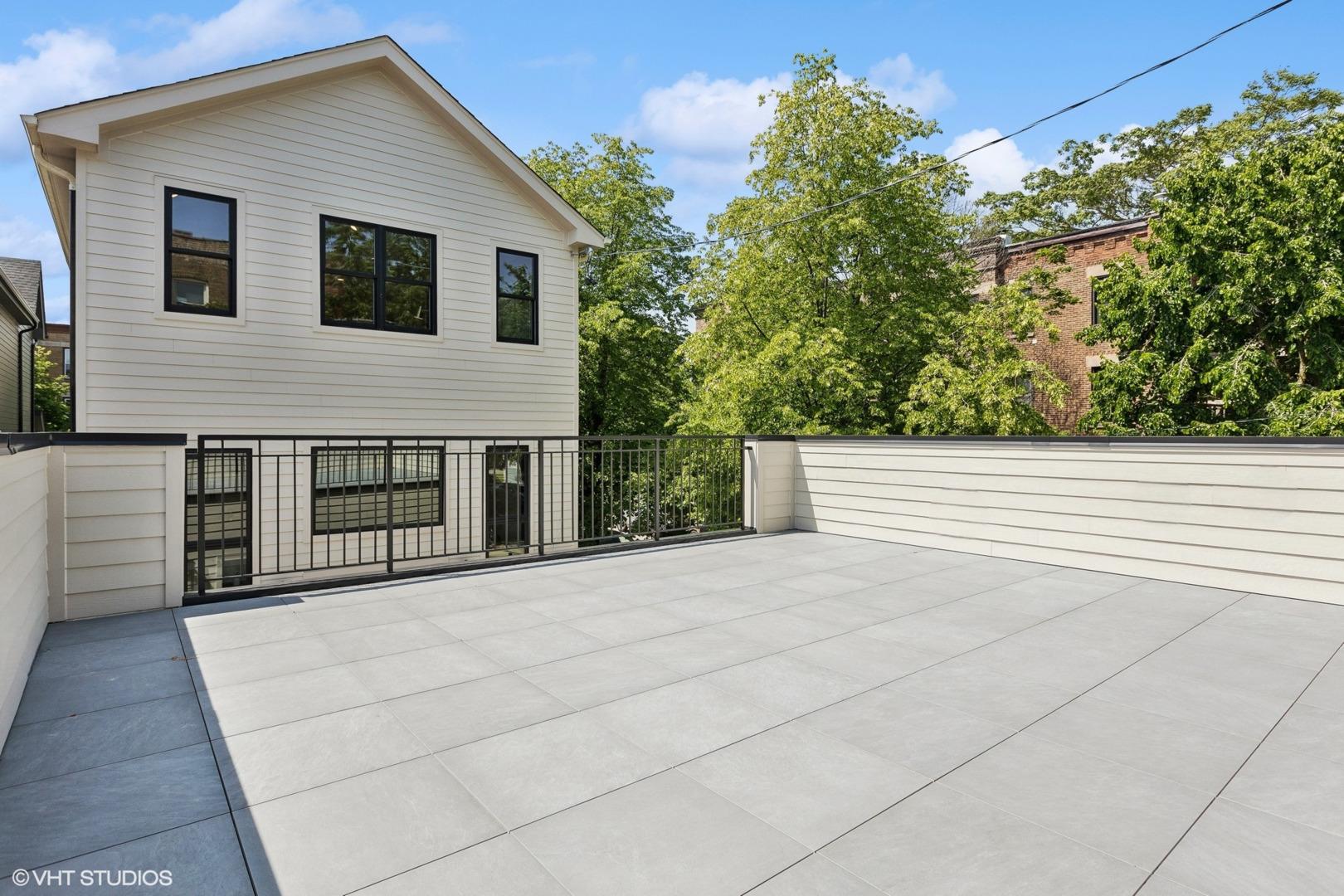 1850 West Cuyler Avenue Chicago, IL 60613 - Photo 54 of 58 a front view of a house with a garage