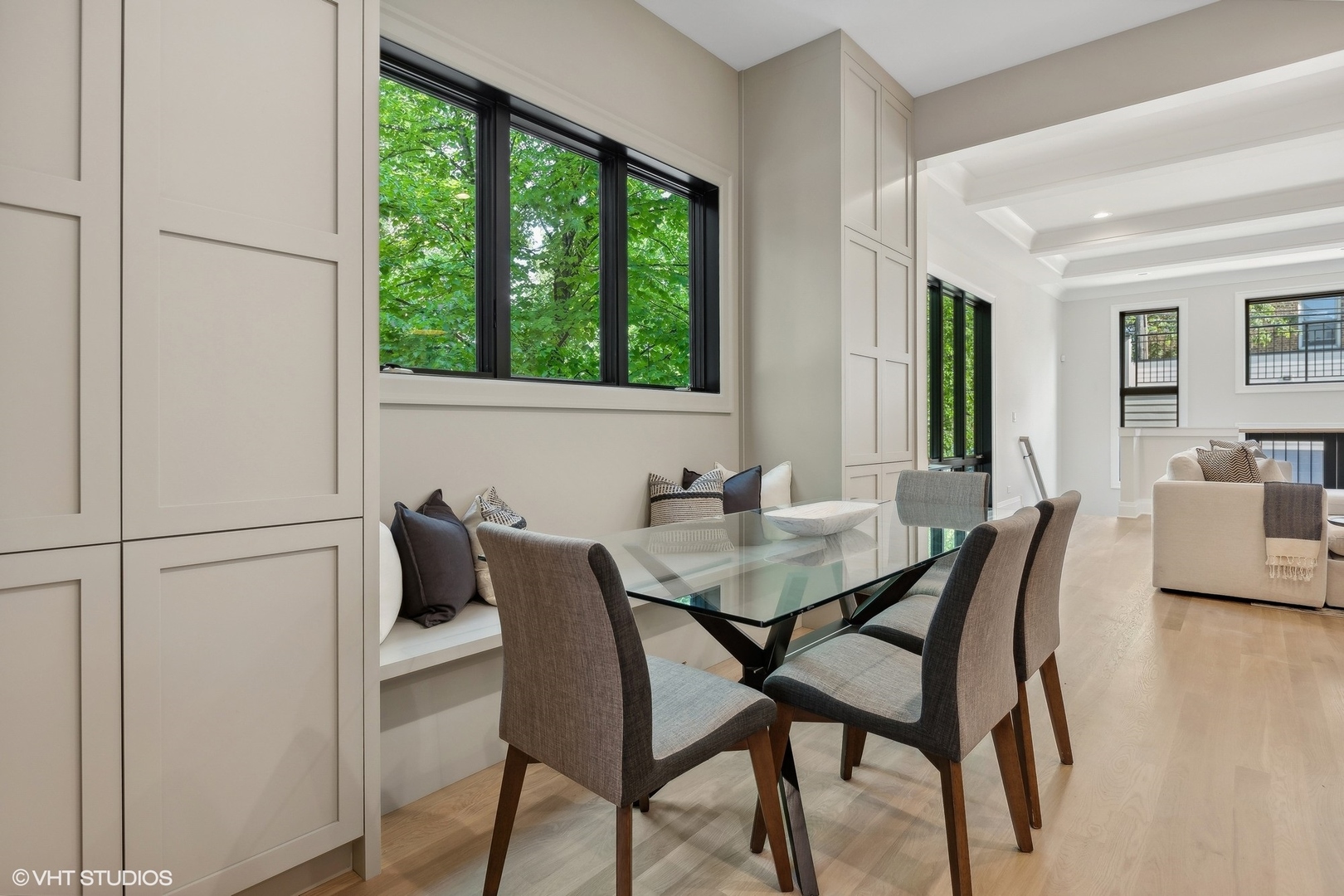 1850 West Cuyler Avenue Chicago, IL 60613 - Photo 7 of 58 a view of a dining room with furniture and window