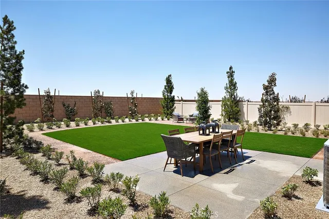 a view of a patio with a yard