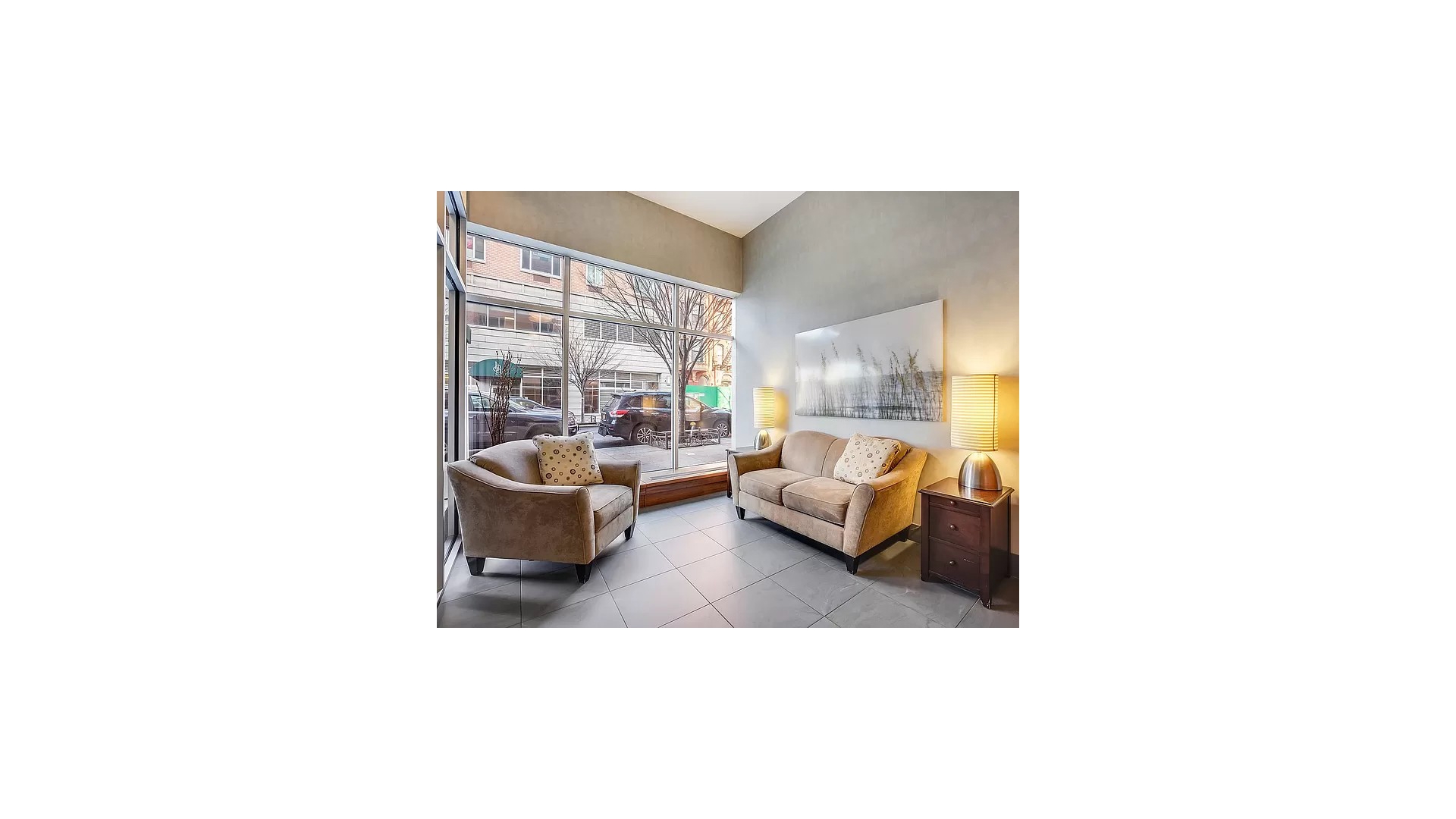 2279 3rd Avenue, Unit 3A Manhattan, NY 10035 - Photo 13 of 14 a living room with furniture and a large window
