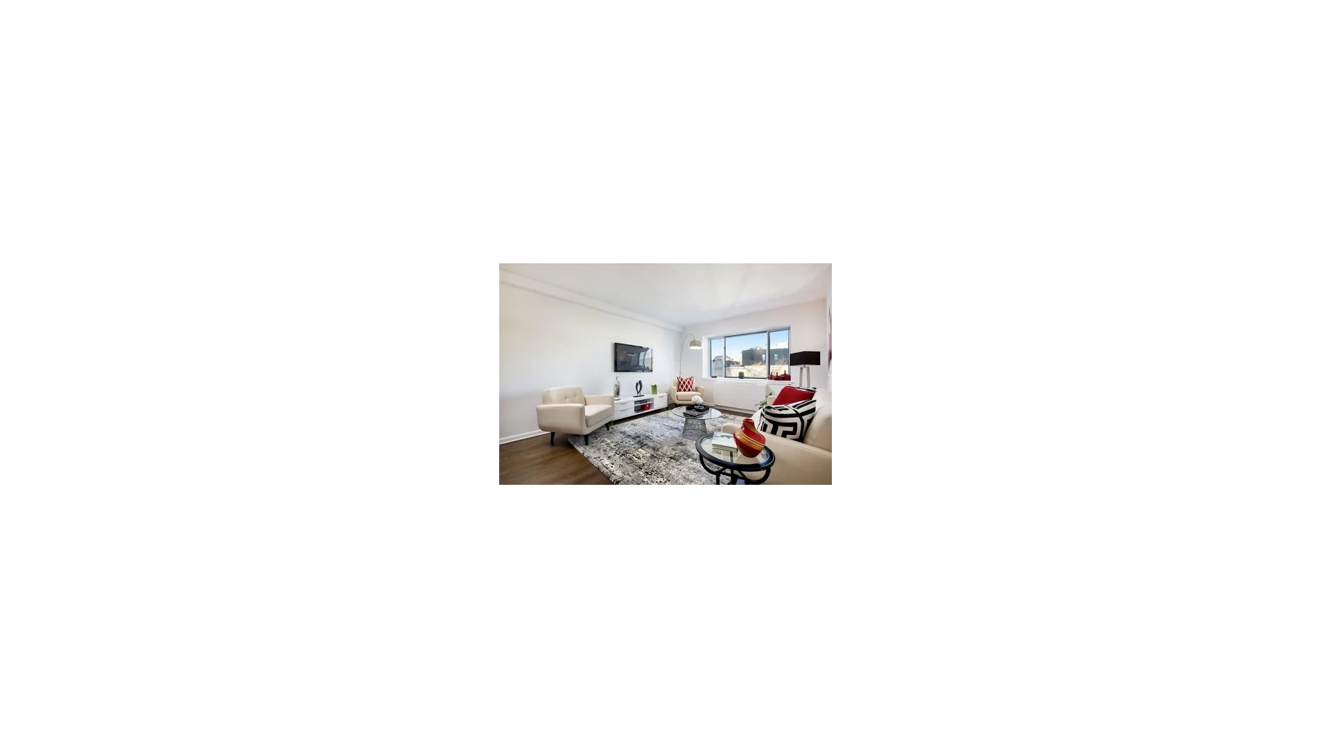 2279 3rd Avenue, Unit 3A Manhattan, NY 10035 - Photo 5 of 14 a view of a living room with a chair