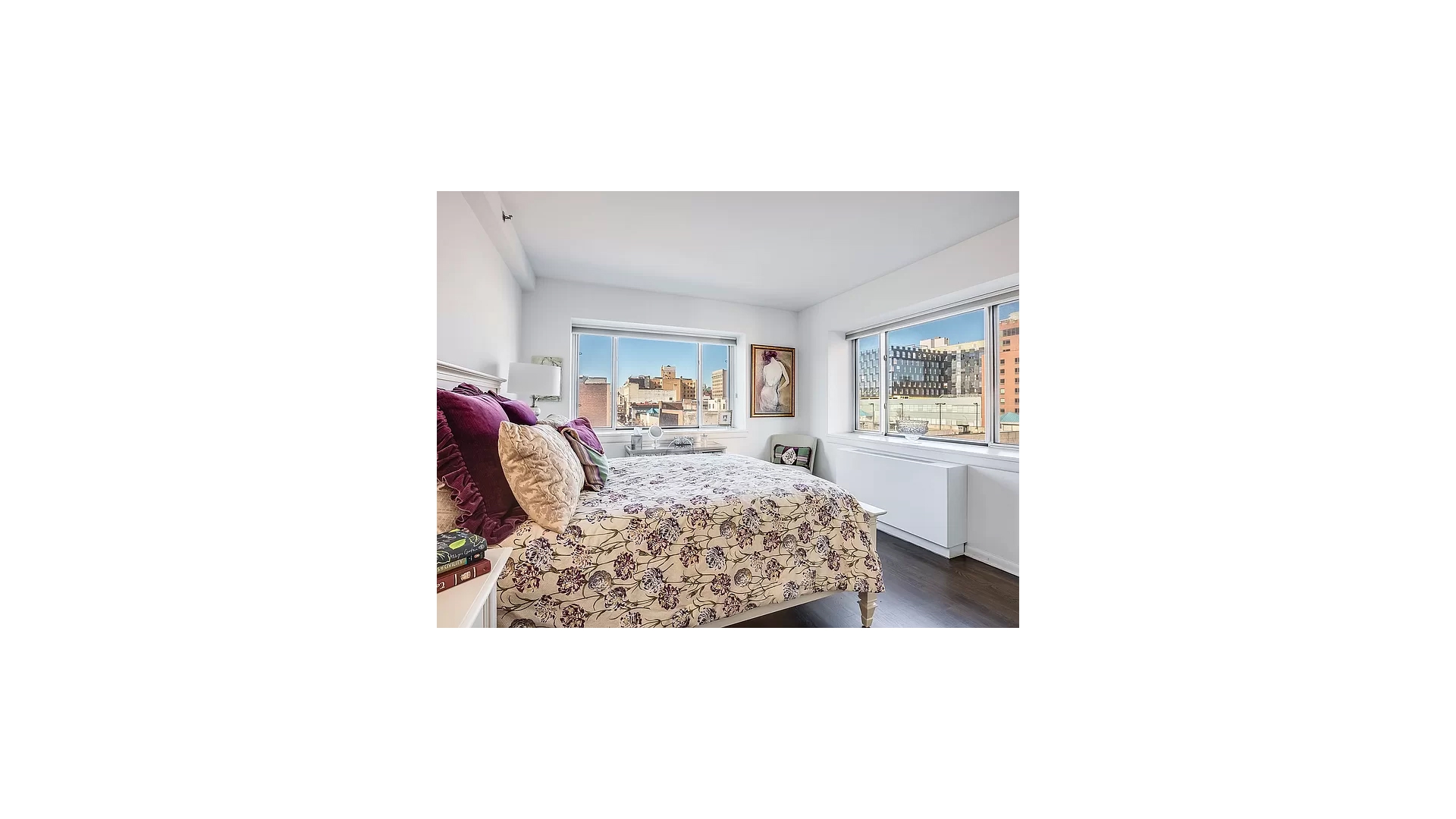 2279 3rd Avenue, Unit 3A Manhattan, NY 10035 - Photo 6 of 14 a living room with a couch and a potted plant
