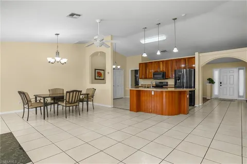 a view of a livingroom with furniture and a fireplace