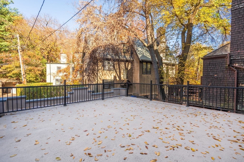 63 Griggs Road Brookline, MA 02446 - Photo 19 of 20 a view of backyard space with wooden fence